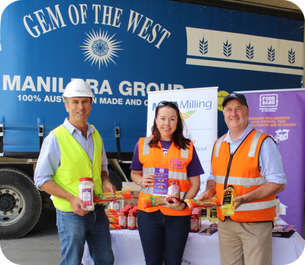 L-R: MSM Milling director Pete Mac Smith, Foodbank Australia CEO Brianna Casey, and Manildra flour mill manager John Brunner with the product of their donations.