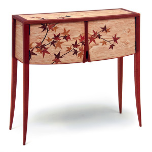 Craig, Thibodeau. Maple Leaf Cabinet, mahogany, spalted maple, curly eucalyptus, cherry and madrone with Japanese maple leaf marquetry.