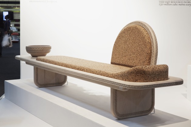 Meraki Daybed by Laurie Wiid van Heerden: The Meraki Daybed, made using cork and American soft maple, is the result of a decision to create African furniture in combination with more modern geometric shapes. The shape and concept for the headrest derived from research based on the Senufo people of West Africa. The carving is a focal point which emphasizes the importance of the handmade aesthetic, as opposed to only machine manufacturing. Cork is also used as an alternative to upholstery, where the emphasis is based on sustainability in combination with an unconventional material.