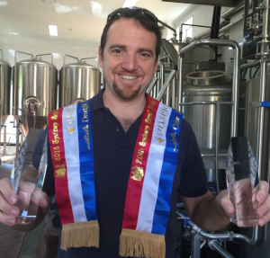 Lovedale's head brewer Michael Capaldo with trophies from the Royal Sydney Beer and Cider Show.