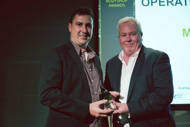 Scott Stephens receives his 2016 Operational Excellence award from Car Craft's Peter McMahon