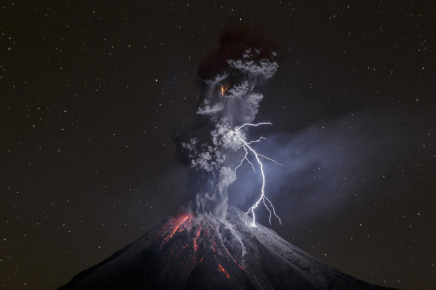 Nature, 3rd prize singles. &copy; Sergio Tapiro, Mexico, 2015. The Power of Nature. Colima Volcano in Mexico shows a powerful night explosion with lightning,
ballistic projectiles and incandescent rockfalls; image taken in the Comala municipality in Colima, Mexico, 13 December 2015.
