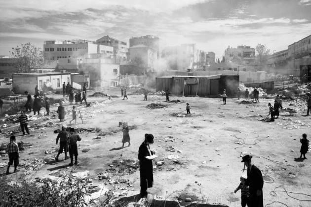 Street Single Image Winner. Mea Shearim is an insular neighborhood in the heart of Jerusalem. Life revolves around strict adherence to Jewish law, prayer, and the study of Jewish religious texts. Photo &copy; Ofir Barak.