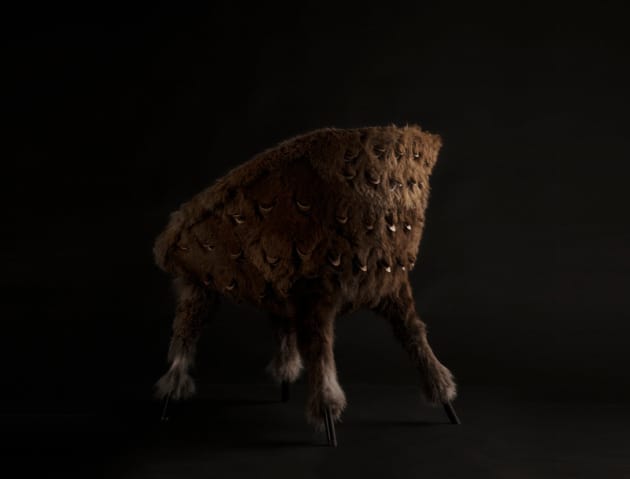 TRENT JANSEN | NSW

In Western Arrernte mythology, pankalangu is a territorial being living in the scrub, camouflaged in the desert and bush. He moves with the rain, made visible when droplets fall over his body &ndash; caught by the light they define his form in a glistening silhouette.

The Pankalangu Arm Chair layers an intricate lattice of Tasmanian wallaby pelt over copper &ndash; The pelt covers the copper, exposing copper tips at the end of each scale-shaped incision.