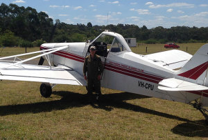 Paul Reynolds with a Piper Pawnee glider tug of the Southern Cross Gliding Club.