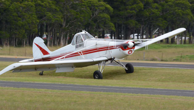 This glider tug pilot finds himself in a hole as he lands on the grass beside the runway. (Steve Hitchen)