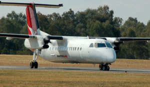 A Qantaslink Dash 8 regional airliner taxis in at Albury. (Steve Hitchen)