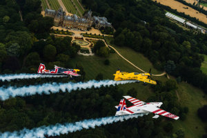 Peter Besenyei, Nigel Lamb and Paul Bonhomme cruise over Waddesdon Manor in Buckinghamshire in the lead up to Sunday's Red Bull Air Race at Ascot. (Red Bull Content Pool/Armin Walcher)