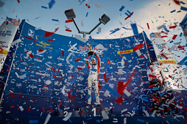 Matthias Dolderer hold the World Championship trophy aloft amid a storm of confetti at Las Vegas. (Balazs Gardi/Red Bull Content Pool)