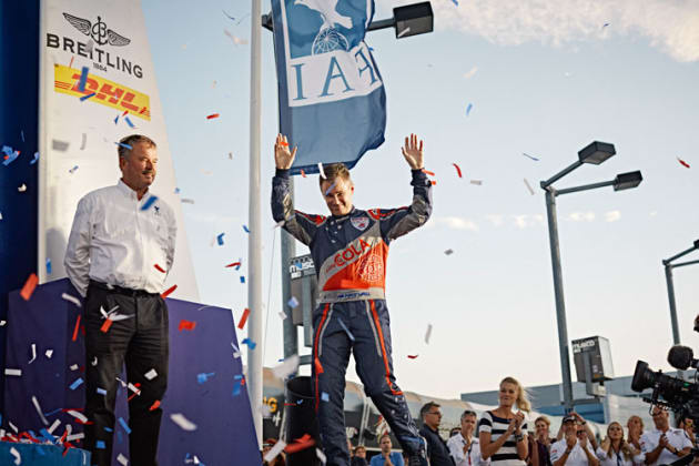 Matt Hall strides onto the podium to collect his second straight championship runner-up trophy. (Balazs Gardi/ Red Bull Content Pool)