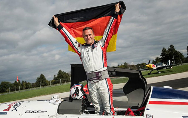 A triumphant Matthias Dolderer after securing the 2016 Red Bull Air Race World Championship at Indianapolis. (Joerg Mitter/ Red Bull Content Pool)