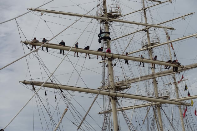 Rolling up the sails &ndash; not for those with a fear of heights.