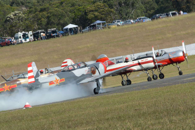 The Russian Roolettes team of Yak 52s and Nanchang CJ6s at the holding point. (Steve Hitchen)
