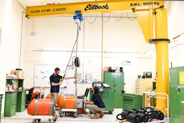 QinetiQ technicians service Navy training mines at the HMAS Waterhen facility. Credit: QinetiQ Australia