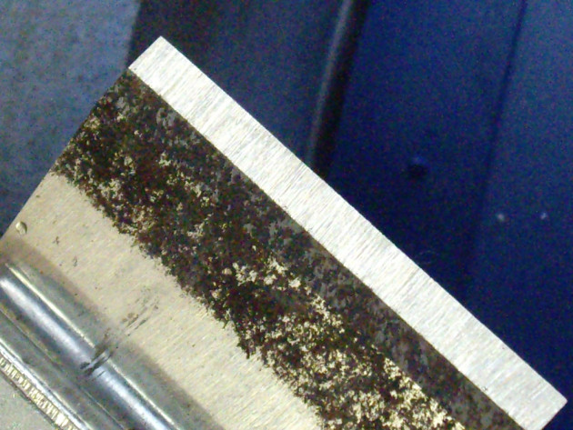 Scheppach grinder, close-up of plane blade ground - the edge is straight and square.