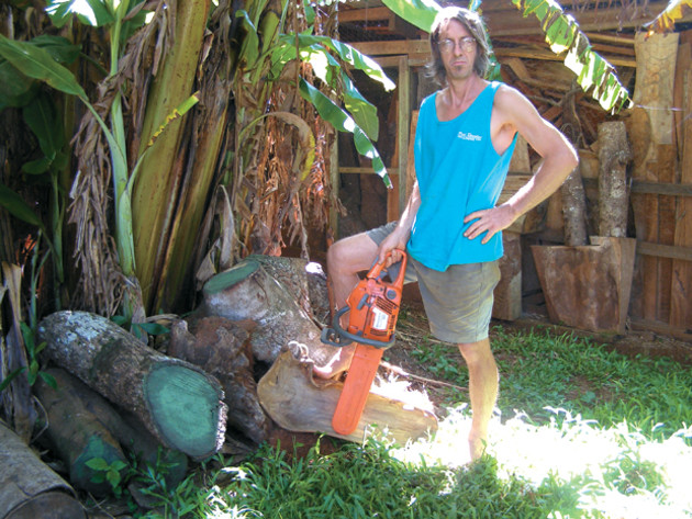 Michael Koren, chainsaw at the ready, in 2007, Atherton Tablelands, Qld.