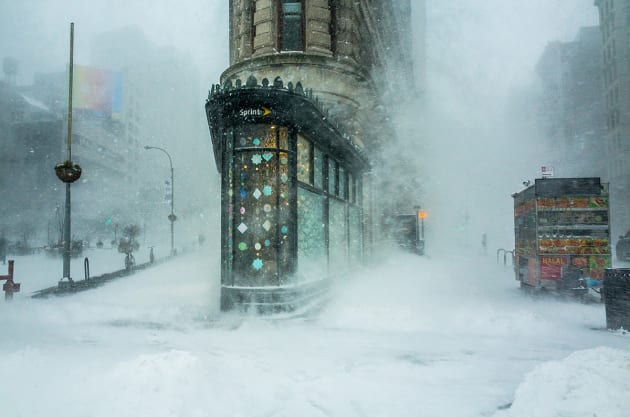 &copy; Michele Palazzo, Italy. Winner, Cities: Architecture &
Spaces.
Flatiron Building, Manhattan, New
York, USA. "While walking through the Jonas snowstorm that swept across the East Coast, I captured this shot of the
Flatiron Building against a backdrop of swirling snow."