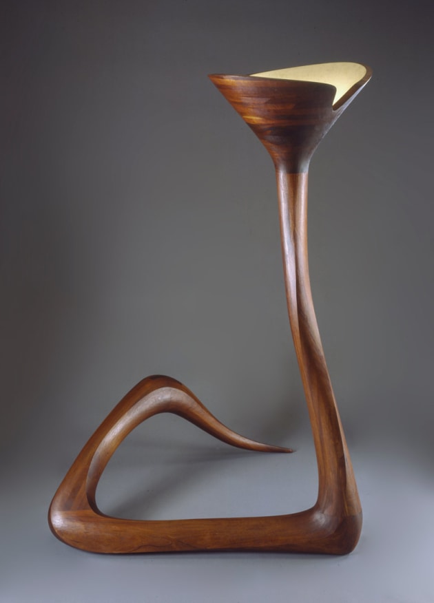 Wendell, Castle, Serpentine Floor Lamp, 1965, mahogany. Courtesy of The Montreal Museum of Fine Arts, Liliane and David M. Stewart Collection, gift of Vivian and David Campbell. Photo courtesy of the Montreal Museum of Fine Arts.