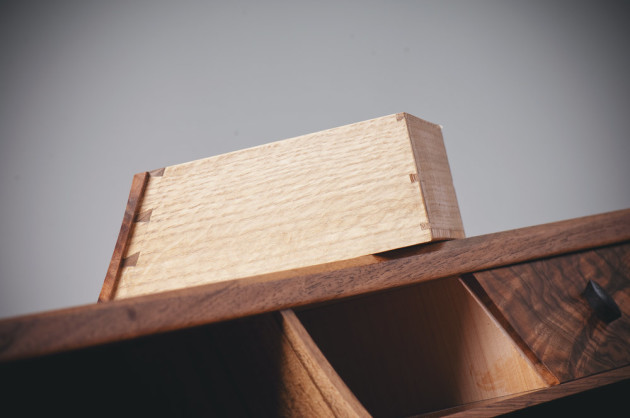 Showing the curved sides and construction of the desk drawers. Photo: Daniel Allen.
