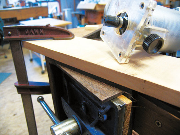 Lower sides of the box shown after removing half the thickness with a trim router and bearing guided bit.
