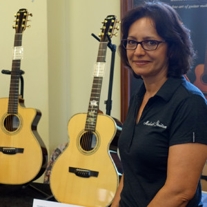 Yvonne Melville with instrument by Melville Guitars, www.melvilleguitars.com