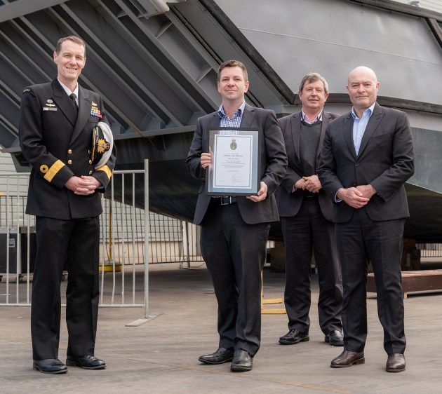 Sydney City Marine team and CDRE Colin Dagg, CSC, RAN - Director General Engineering &ndash; Navy at the signing ceremony for SCM achieving ADF docking certification.