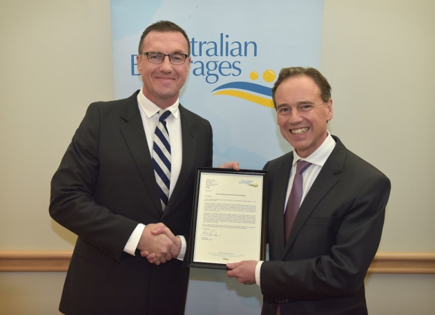 Geoff Parker with Greg Hunt, Australia's Federal Health Minister, at the signing of the industry&rsquo;s sugar reduction pledge in June 2018 in Canberra.