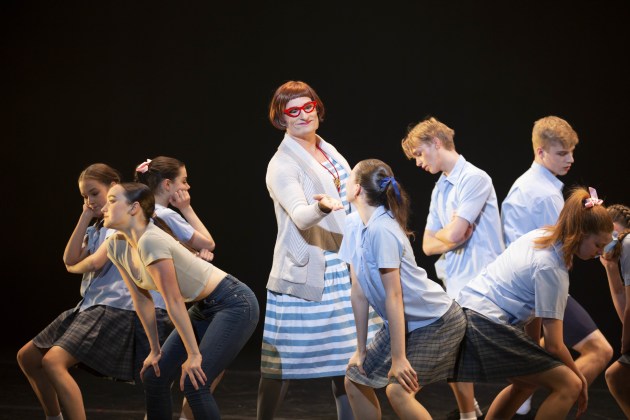 Guest artist David McAllister as Ms Puttyfoot with students of the Australian Ballet School. Photo: Lynette Wills.