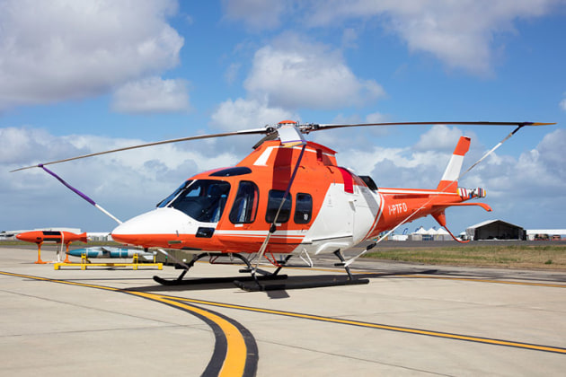 This Agusta Westland AW139 was on the ramp bearing temporary Italian registration. (Phil Hosking)