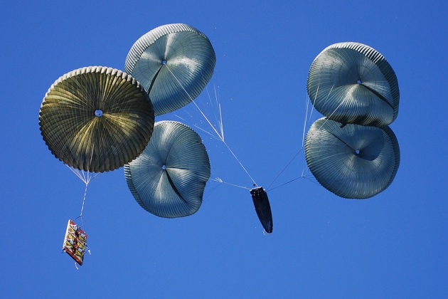 Naval Special Warfare Rigid Hull Inflatable Boats being air dropped. 

Credit: United States Marine Inc
