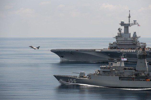 HMAS Toowoomba alongside the French aircraft carrier Charles de Gaulle during flight operations while on exercise.
Supplied