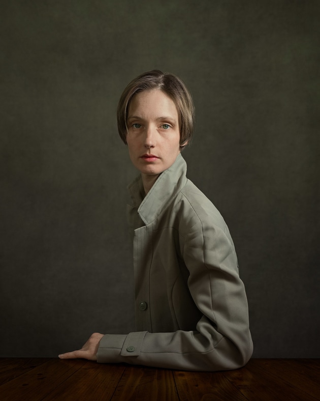 Amanda, 2017 by Bill Gekas. Amanda is a friend of the family and single mother of two young children. She had broken up with her partner just hours before this photo was taken. Her gaze into the lens portrays a sense of uncertainty about the future, yet a willingness and strength to persevere, to get through whatever may lie ahead.