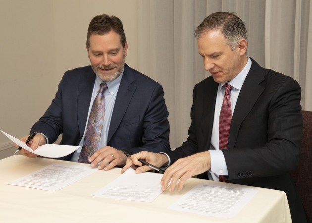Signing up for advancing packaging sustainability: Michael Zamora, senior vice president Product Solutions at ExxonMobil (left) and Ron Delia, CEO Amcor.