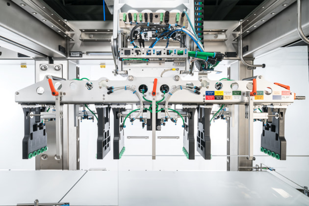The compact solution at Pixie Ice Cream combines a picker line with a packing line.