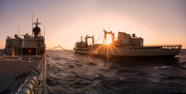 HMAS Anzac and Success replenishing at sea during the passage from the Philippines to Vietnam.  Credit: Defence