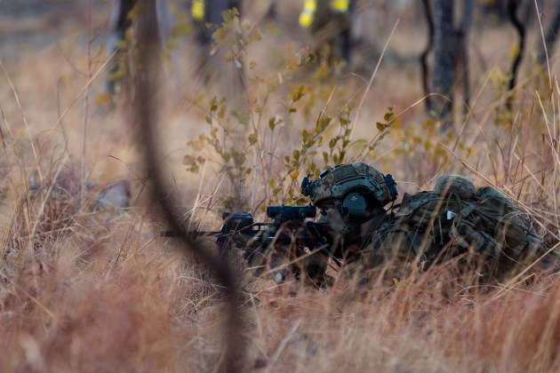 A soldier takes up a firing position during an exercise in the NT.
Defence