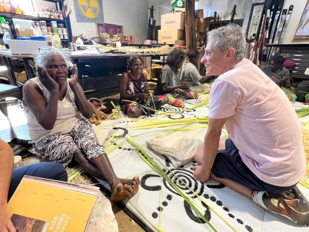 Artists June Nadjamerrek and Saffron LamiLami chat with Arkin Djemal, Helen Kaminski and Indigenous Fashion Projects as they visit Marrawuddi Arts & Culture 2022. Image: Supplied