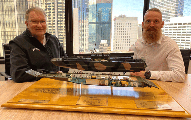 Serco Defence Managing Director, Clint Thomas and Serco Defence Pursuit Manager, Terry Skinsley with the &lsquo;Oboe&rsquo; LMV-M model. (Serco Defence)