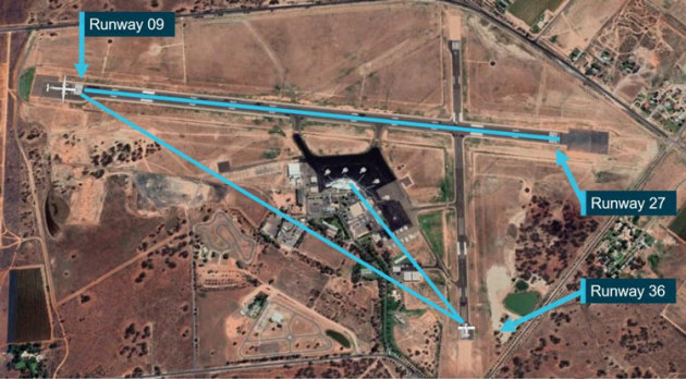 Buildings and trees at Mildura meant that the crews of the two aeroplanes were unable to see each other at the thresholds. (Google Earth annotated by the ATSB)