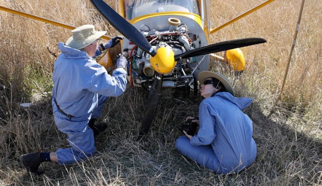 ATSB investigators at the forced landing site of VH-VIK near Tumut. (ATSB)