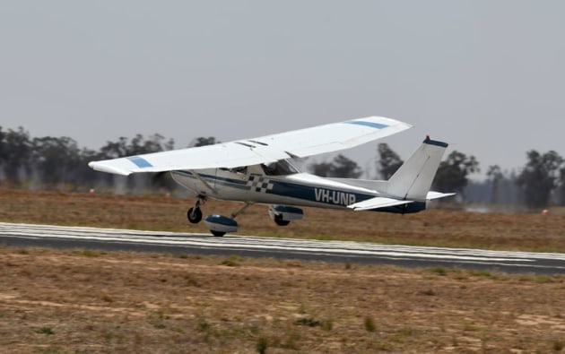 Latrobe Valley's Gerard Lappin shows how to handle a crosswind as he lands his C152 after an elegant display of aerobatics. (Steve Hitchen)