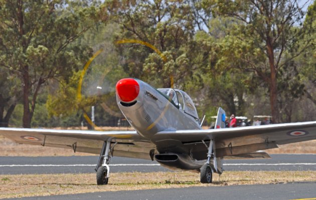 Pilot Don Gordon points the Mustang into the wind to better cool the engine as he waits his turn. The Mustang developed an undercart issue on take-off and the display had to be aborted. (Steve Hitchen)