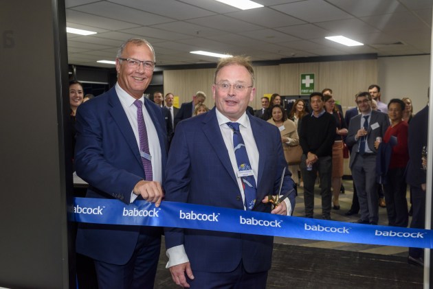 Babcock International Group CEO David Lockwood cuts the ribbon on Babcock's new Canberra Office with Babcock Australasia CEO David Ruff. (Babcock Australia)