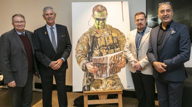 Serco Defence Managing Director Clint Thomas; Doug Baird, father of CPL Cameron Baird VC MG; Michael Madden, author of The Victoria Cross: Australia Remembers; George Petrou, the artist.
Serco