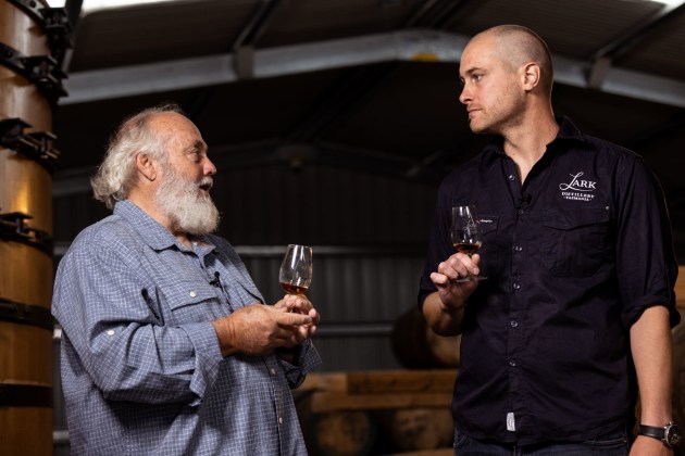 Founder Bill Lark and managing director Geoff Bainbridge when Lark Distillery announced it was carbon neutral.
