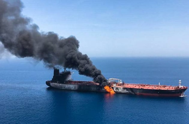 A Norwegian-owned tanker burning in the Gulf of Oman. 
AFP via @FanackMENA