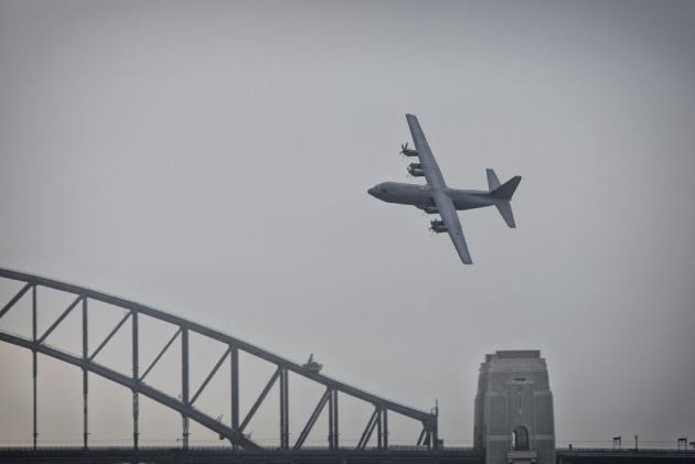 A RAAF C-130J Hercules conducts a handling display over Sydney Harbour.
Defence