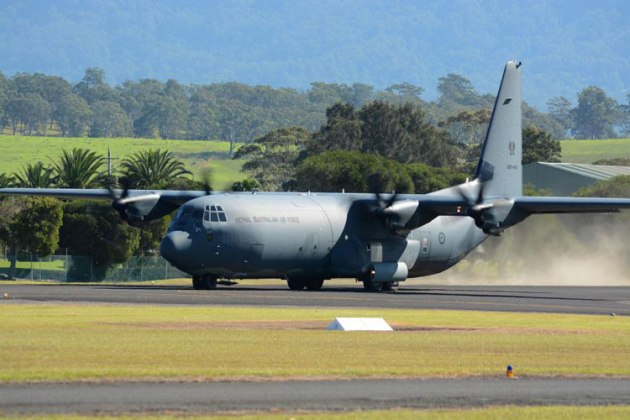 A C130J powers up for a maximum effort take-off. (Steve Hitchen)