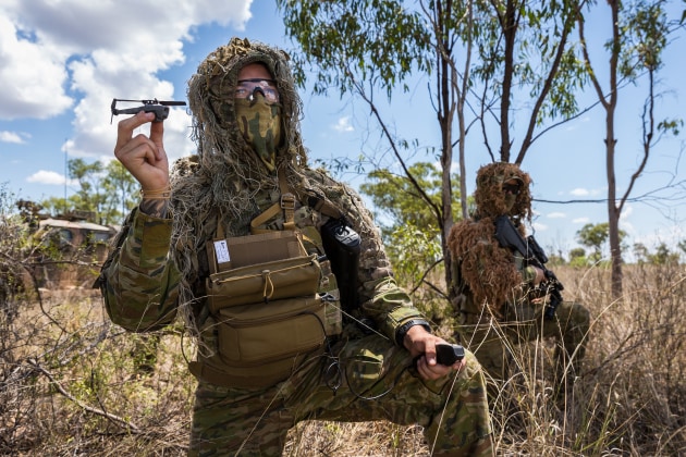 A soldier prepares to launch a PD-100 Black Hornet Nano unmanned aircraft.
Defence