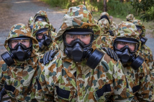Soldiers take part in respiratory mask practice during a training activity at Gallipoli Barracks in 2019.
Defence